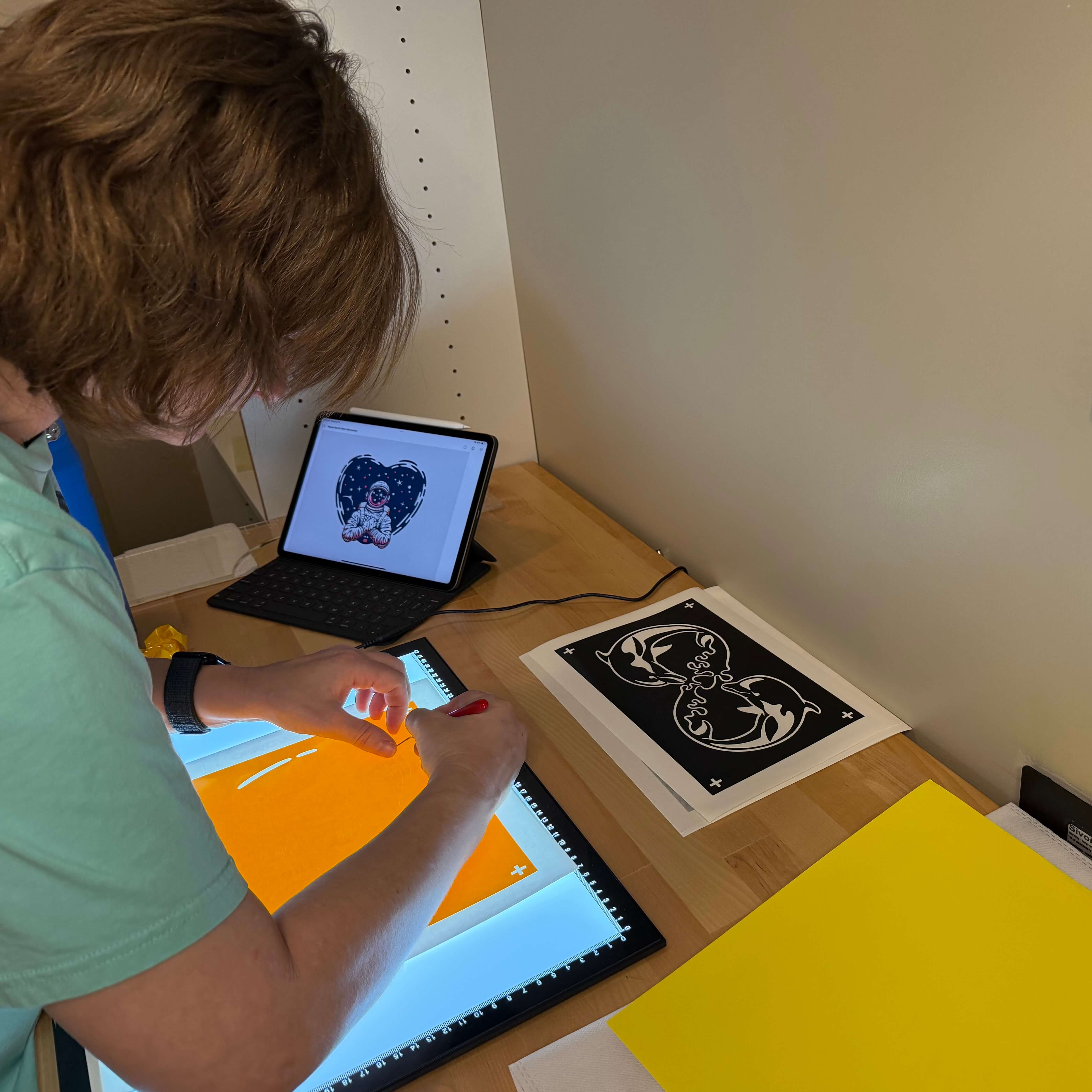 Quinn prepping screens for Los Místicos prints